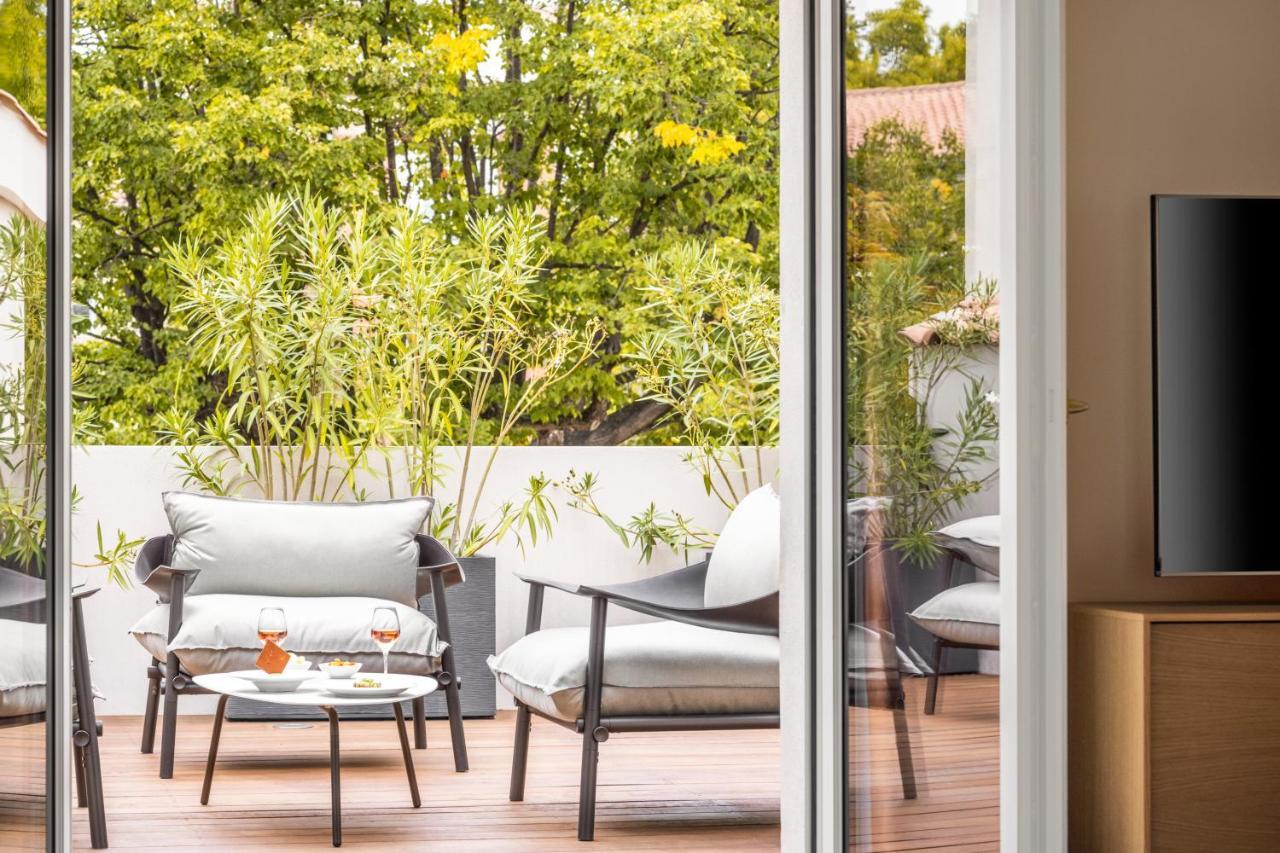 Maison Albar Hotels L'Imperator Nimes Exterior photo A sliding door