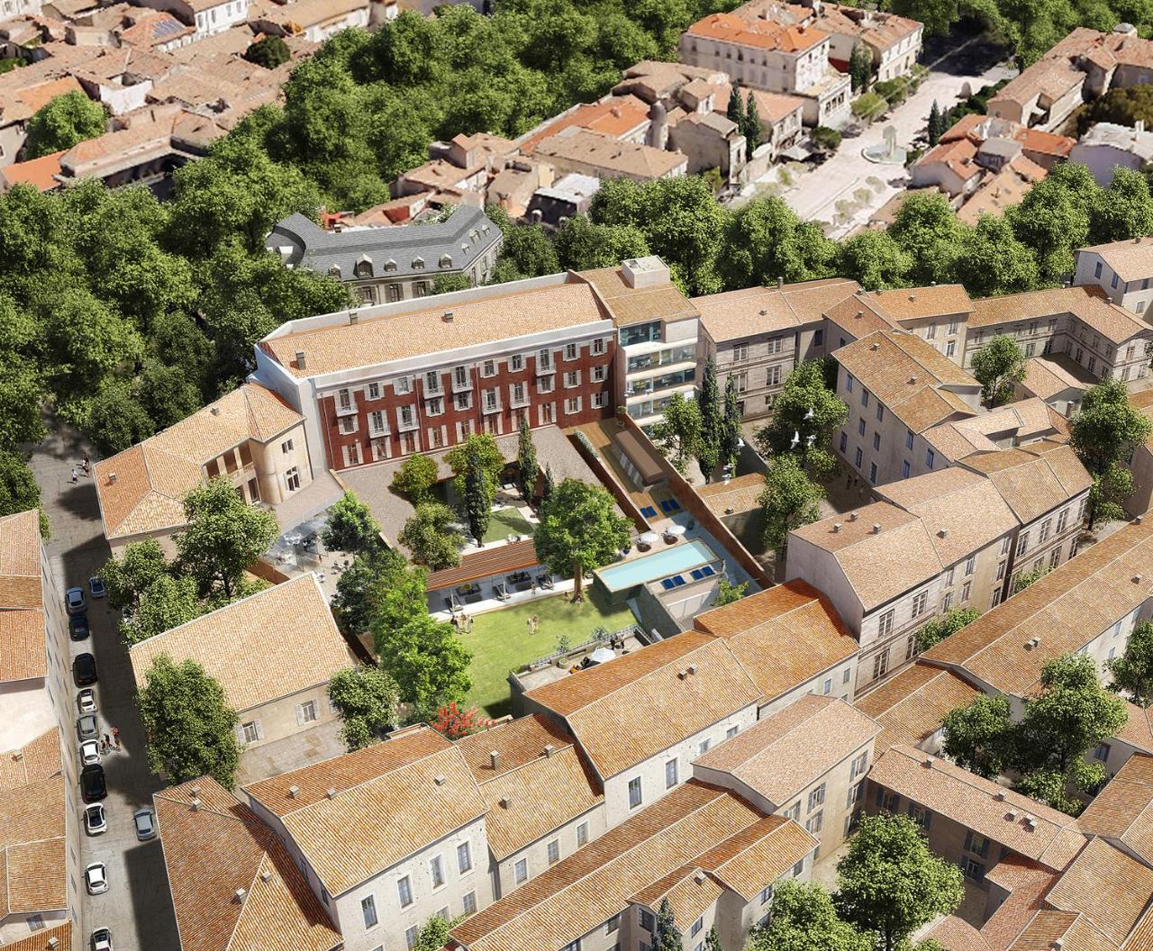 Maison Albar Hotels L'Imperator Nimes Exterior photo Aerial view of the town