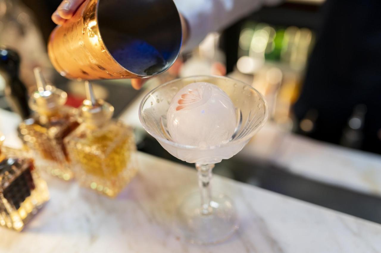 Maison Albar Hotels L'Imperator Nimes Exterior photo A glass of champagne